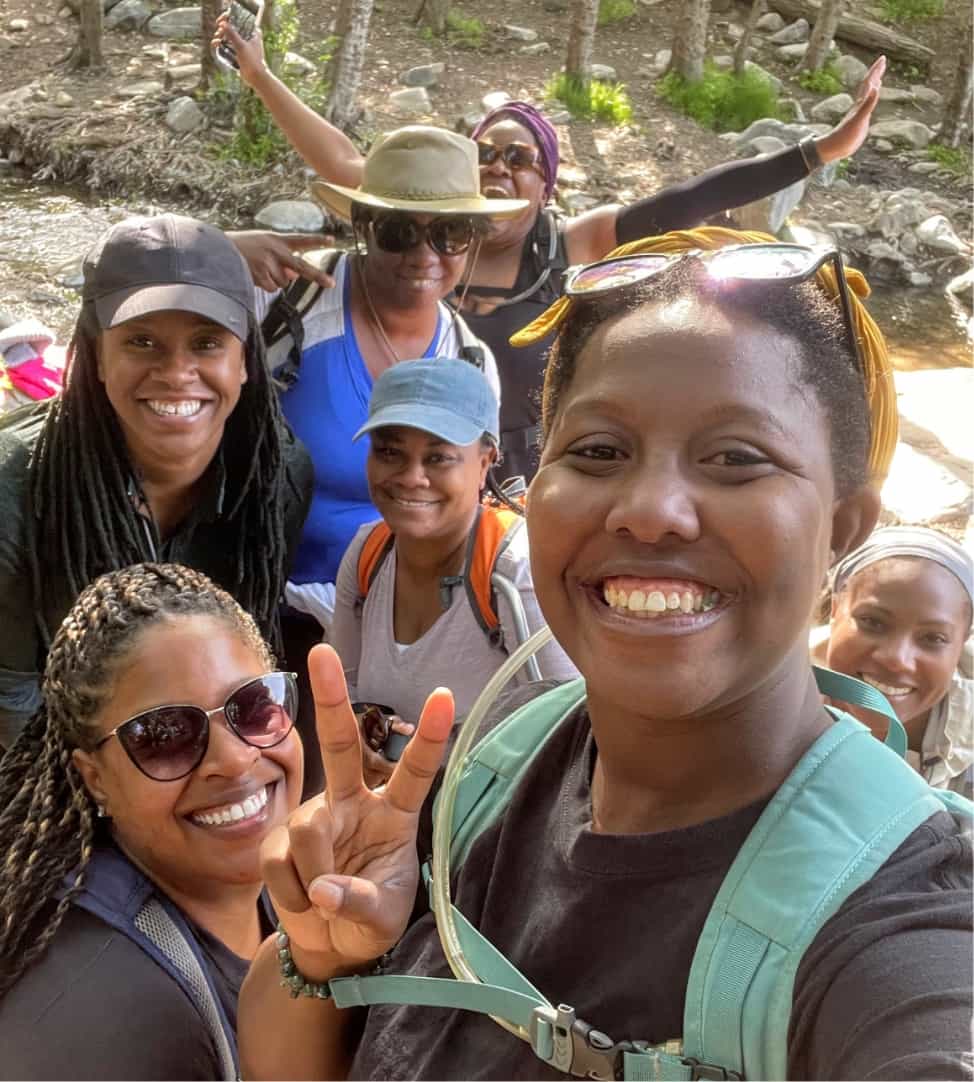 Black women hiking as part of the Black Girls Trekkin group